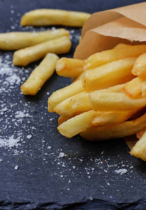 Duck fat fries on a slate board