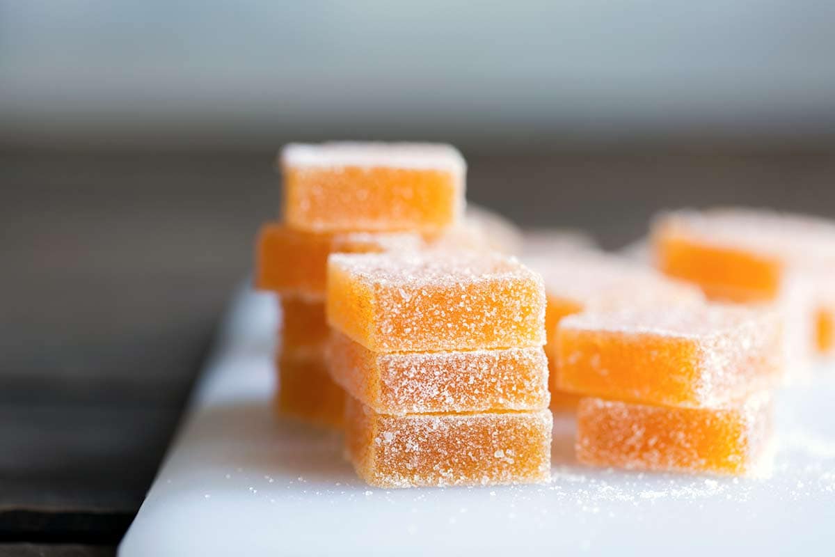 Photo of homemade gummies on a cutting board.