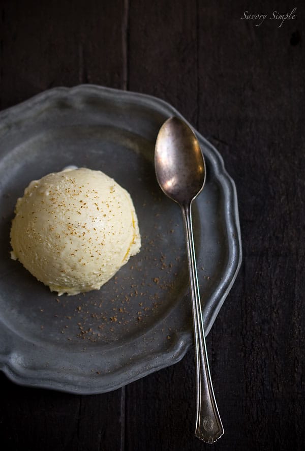 The Ultimate Horchata Ice Cream - Savory Simple Horchata Ice Cream recipe, served on a plate with a spoon.