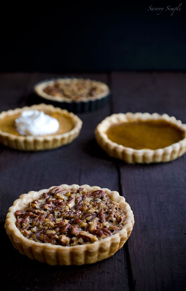 Thanksgiving Pie Tarts - Individual pumpkin pie, pecan pie and sweet potato pie tarts that will each serve 1-4 people. This is a fun recipe that looks impressive and will allow everyone to enjoy a lighter, more elegant twist on classic Thanksgiving desserts! Thanksgiving Pie Tarts - Individual pumpkin pie, pecan pie and sweet potato pie tarts that will each serve 1-4 people. This is a fun recipe that looks impressive and will allow everyone to enjoy a lighter, more elegant twist on classic Thanksgiving desserts!