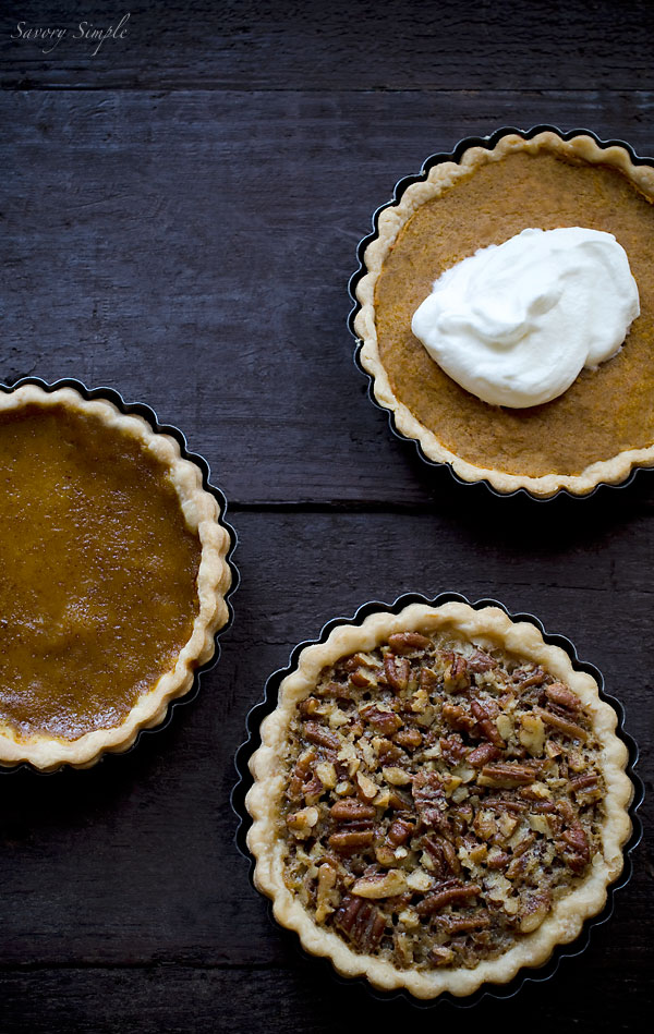 Thanksgiving Pie Tarts - Individual pumpkin pie, pecan pie and sweet potato pie tarts that will each serve 1-4 people. This is a fun recipe that looks impressive and will allow everyone to enjoy a lighter, more elegant twist on classic Thanksgiving desserts! Thanksgiving Pie Tarts - Individual pumpkin pie, pecan pie and sweet potato pie tarts that will each serve 1-4 people. This is a fun recipe that looks impressive and will allow everyone to enjoy a lighter, more elegant twist on classic Thanksgiving desserts!
