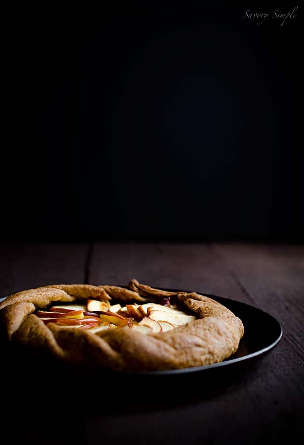 This cheesy apple, cheddar and caramelized onion galette has a flaky whole wheat crust and tons of flavor. It's a perfect, light appetizer. This cheesy apple, cheddar and caramelized onion galette has a flaky whole wheat crust and tons of flavor. It's a perfect, light appetizer.
