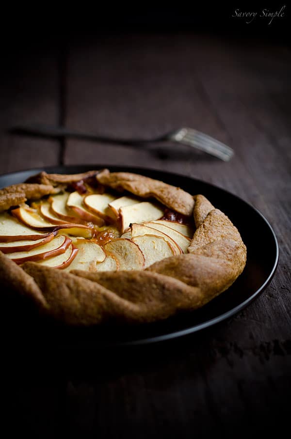 This cheesy apple, cheddar and caramelized onion galette has a flaky whole wheat crust and tons of flavor. It's a perfect, light appetizer. This cheesy apple, cheddar and caramelized onion galette has a flaky whole wheat crust and tons of flavor. It's a perfect, light appetizer.