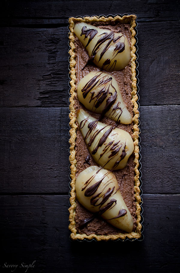 This decadent Chocolate Mousse Poached Pear Tart is the perfect ending to a romantic meal! This decadent Chocolate Mousse Poached Pear Tart is the perfect ending to a romantic meal!