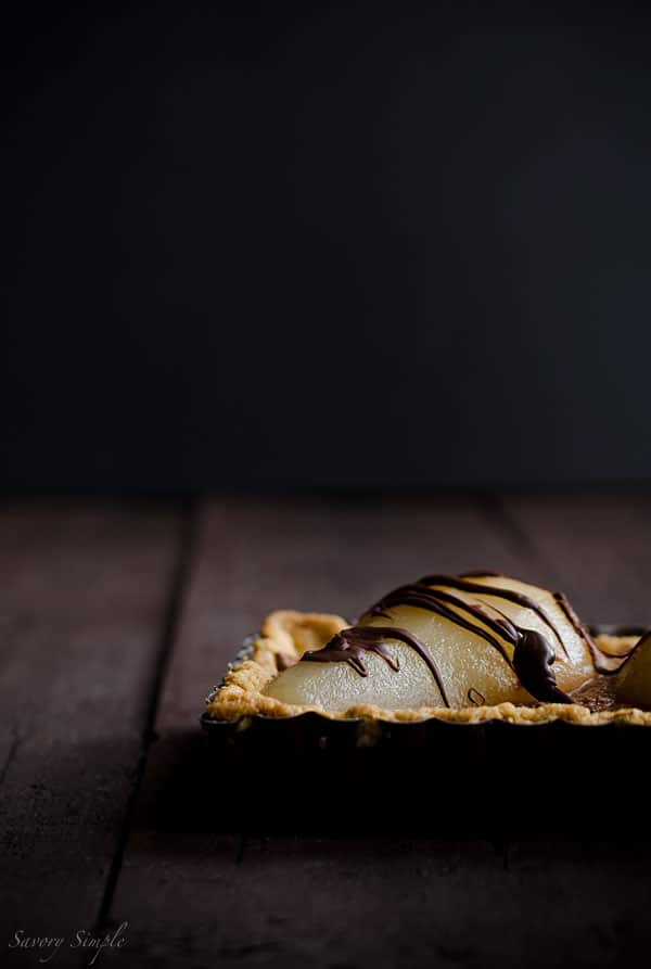 This decadent Chocolate Mousse Poached Pear Tart is the perfect ending to a romantic meal! This decadent Chocolate Mousse Poached Pear Tart is the perfect ending to a romantic meal!