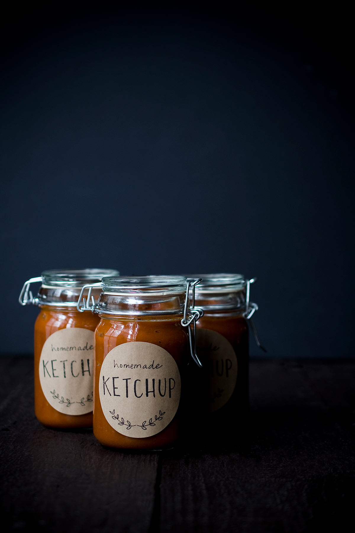 Homemade ketchup in mason jars with custom labels