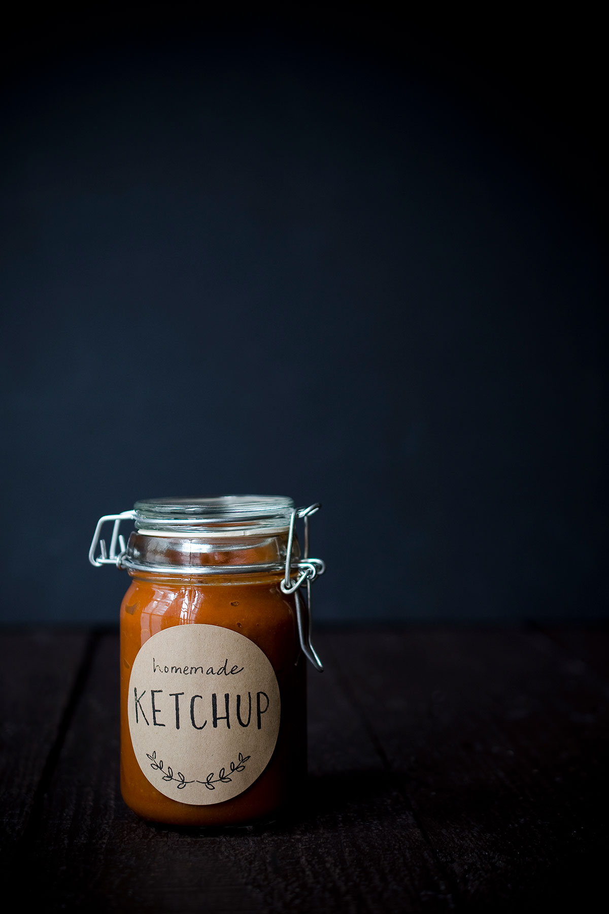 A photo of homemade ketchup in a mason jar