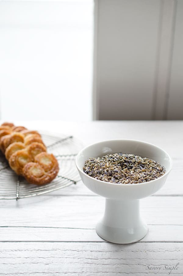 Lavender Vanilla Bean Palmiers are a simple yet elegant cookie. Only 5 ingredients! Make with fresh puff pastry or leftover scraps.