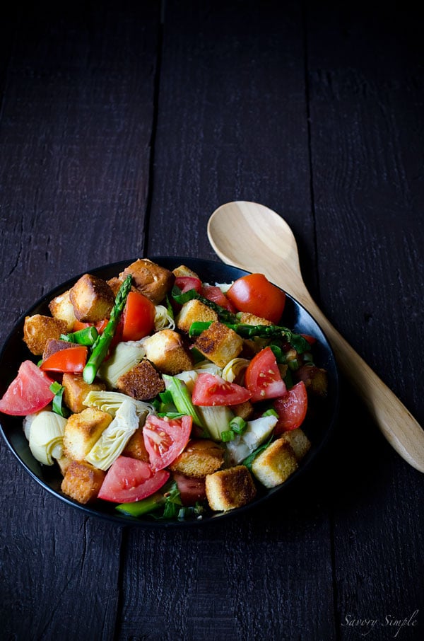 This Spring Panzanella Salad uses hawaiian sweet rolls for a touch of sweetness (though regular crusty bread may be substituted). Asparagus, spring onions and artichokes provide a seasonal twist!