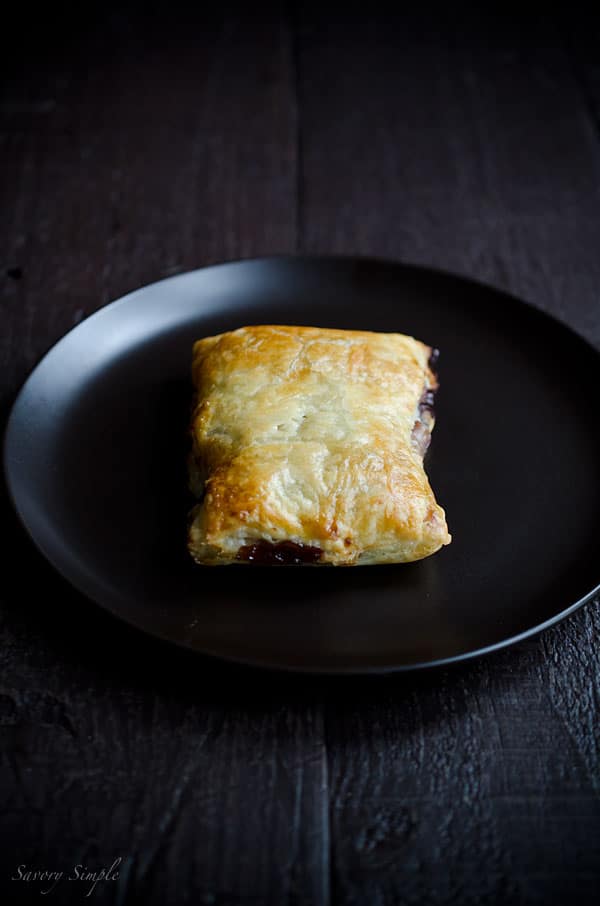 Macerated Cherry Nutella Pop Tarts are pretty much everything you want in a dessert: flaky pastry, creamy chocolate and a boozy fruit filling!
