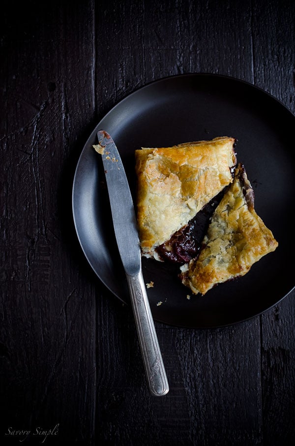 Macerated Cherry Nutella Pop Tarts are pretty much everything you want in a dessert: flaky pastry, creamy chocolate and a boozy fruit filling!