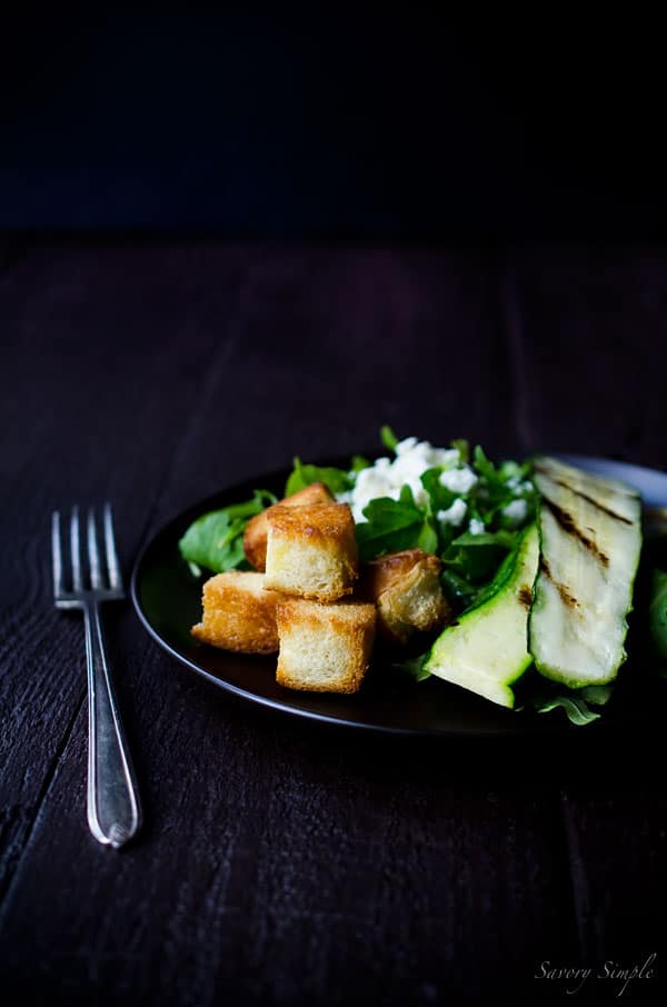 This Grilled Zucchini Salad with Feta and Sweet Croutons offers a perfect balance of flavors.