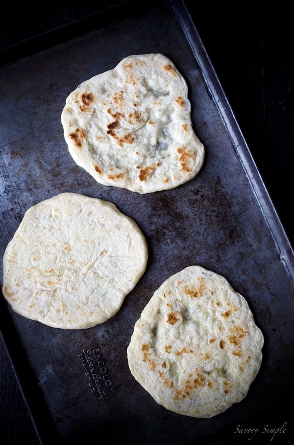 These individual pizzas with pomodoro sauce, burrata cheese and balsamic glaze are a perfectly portioned meal.