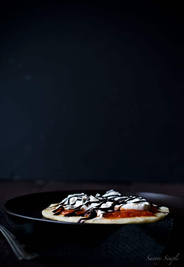 These individual pizzas with pomodoro sauce, burrata cheese and balsamic glaze are a perfectly portioned meal.