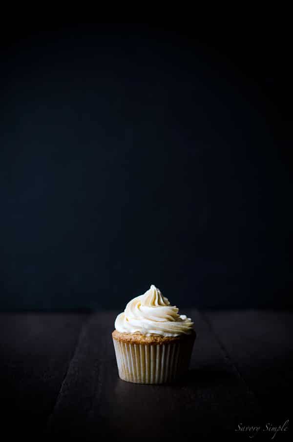 Summer peaches, boozy buttercream... what more does one need in a cupcake? You NEED these Peach Bourbon Cupcakes from Savory Simple!