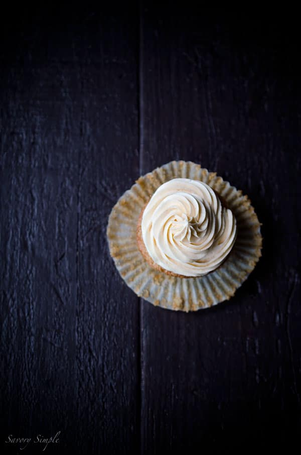 Summer peaches, boozy buttercream... what more does one need in a cupcake? You NEED these Peach Bourbon Cupcakes from Savory Simple!