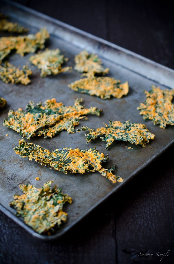 These Cashew and Roasted Red Pepper Kale Chips are savory, crunchy and bursting with flavor. People will beg you for the recipe! (vegan & gluten-free)