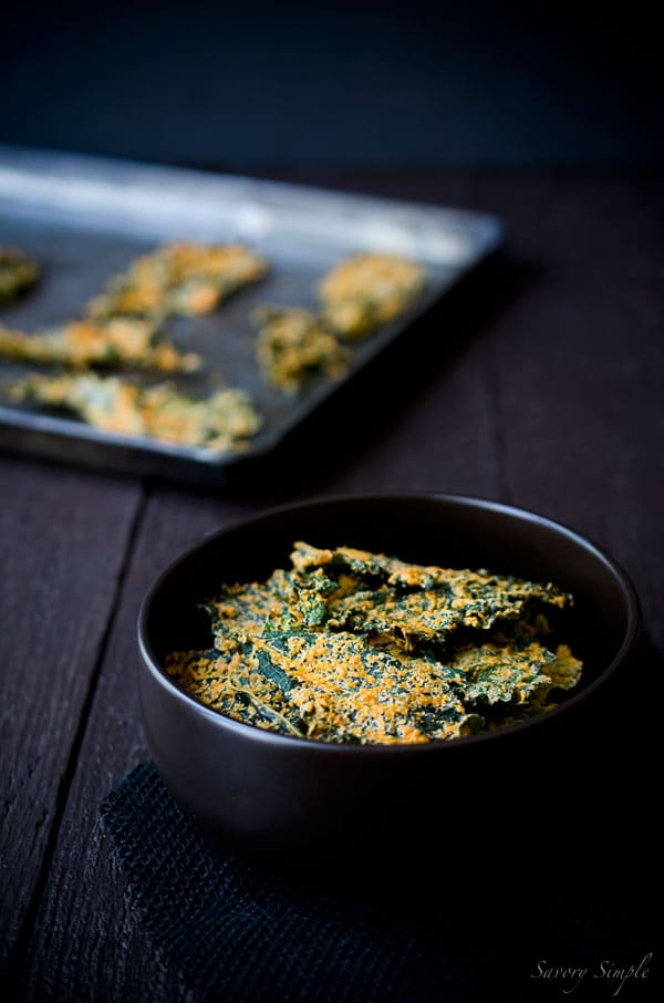 These Cashew and Roasted Red Pepper Kale Chips are savory, crunchy and bursting with flavor. People will beg you for the recipe! (vegan & gluten-free)
