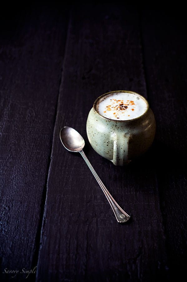 This spicy chocolate latte from Savory Simple will warm you up when it's chilly outside! This vegan latte uses almond milk, but regular milk may be substituted. 