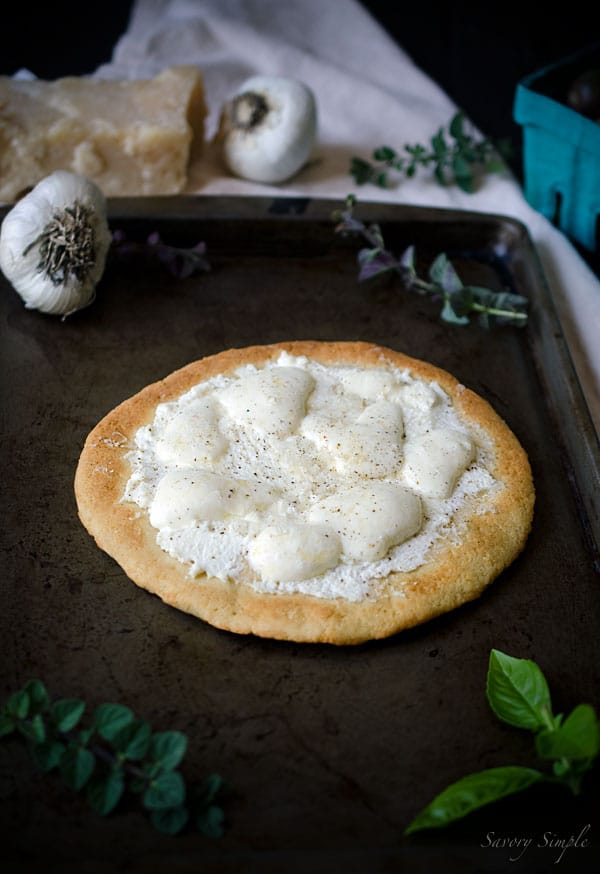 This Gluten-Free Four Cheese White Pizza is completely grain free but you'll never know the difference! Easy and delicious.