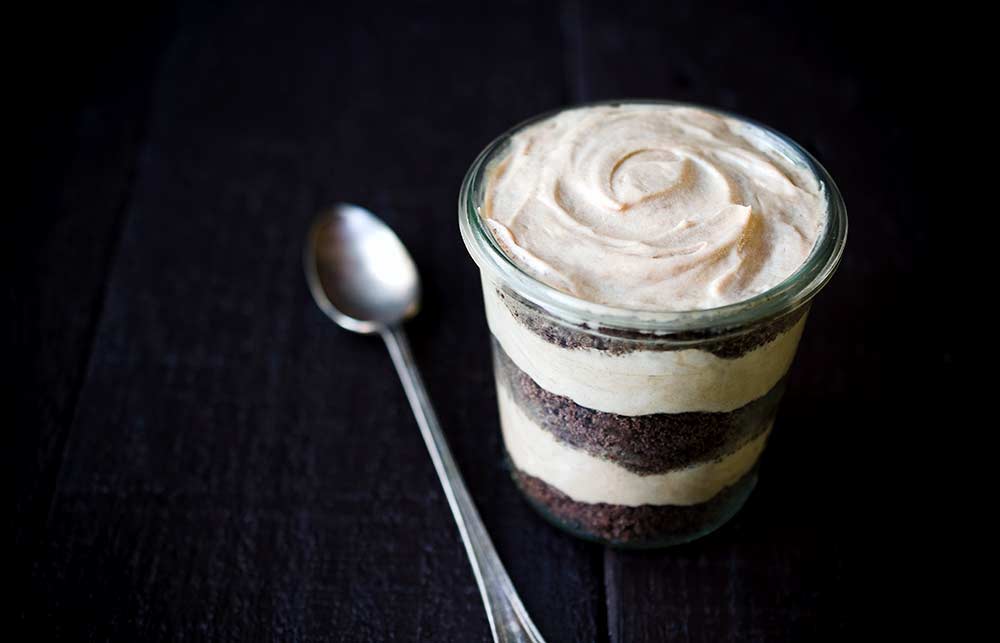 A close up photo of Peanut Butter Nutella Mousse with Chocolate Cookie Crumble.
