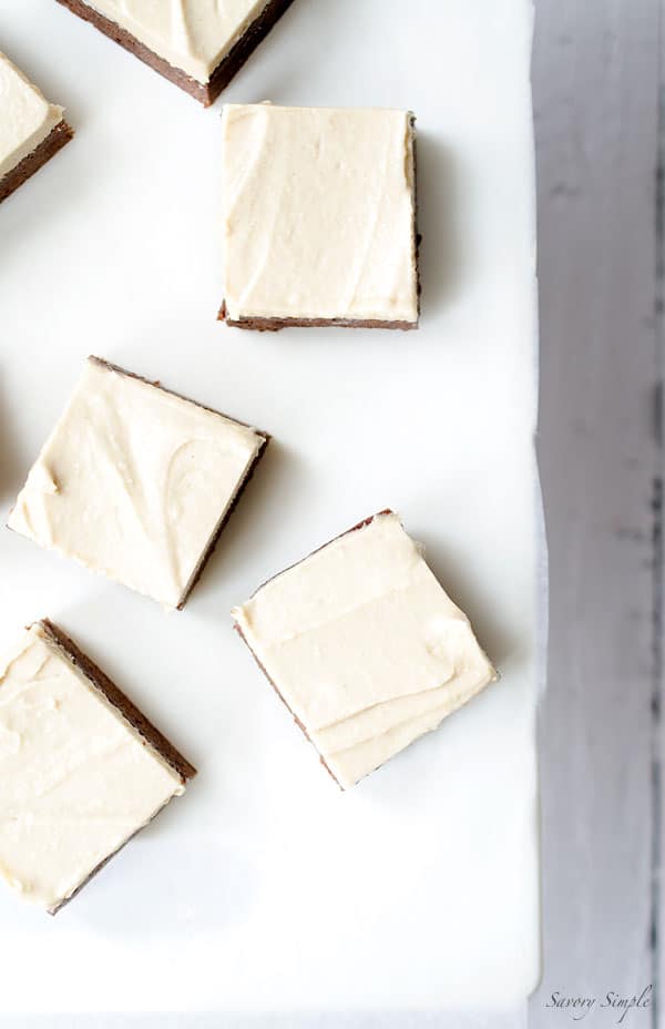 These Chocolate Brownies with Salted Tahini Frosting are a simple, decadent dessert. Get the easy-to-follow recipe from SavorySimple.net