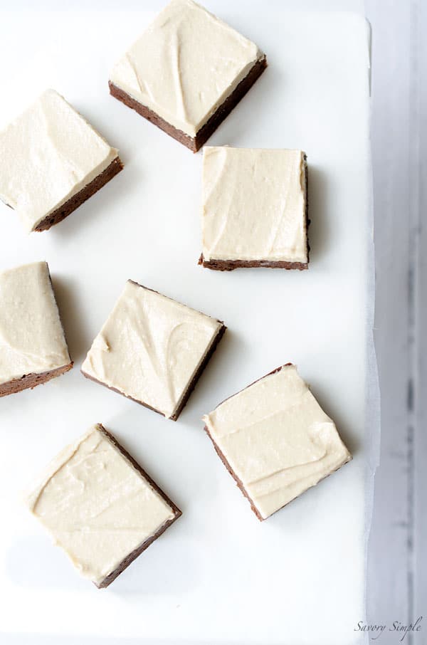 These Chocolate Brownies with Salted Tahini Frosting are a simple, decadent dessert. Get the easy-to-follow recipe from SavorySimple.net