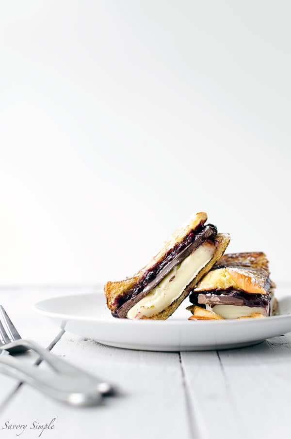 Grilled Brioche with Brie, Dark Chocolate and Blueberries is amazing for dessert or brunch! Get the recipe from SavorySimple.net