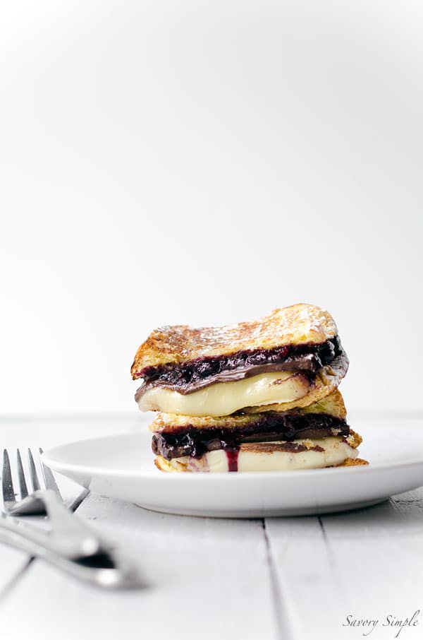 Grilled Brioche with Brie, Dark Chocolate and Blueberries is amazing for dessert or brunch! Get the recipe from SavorySimple.net