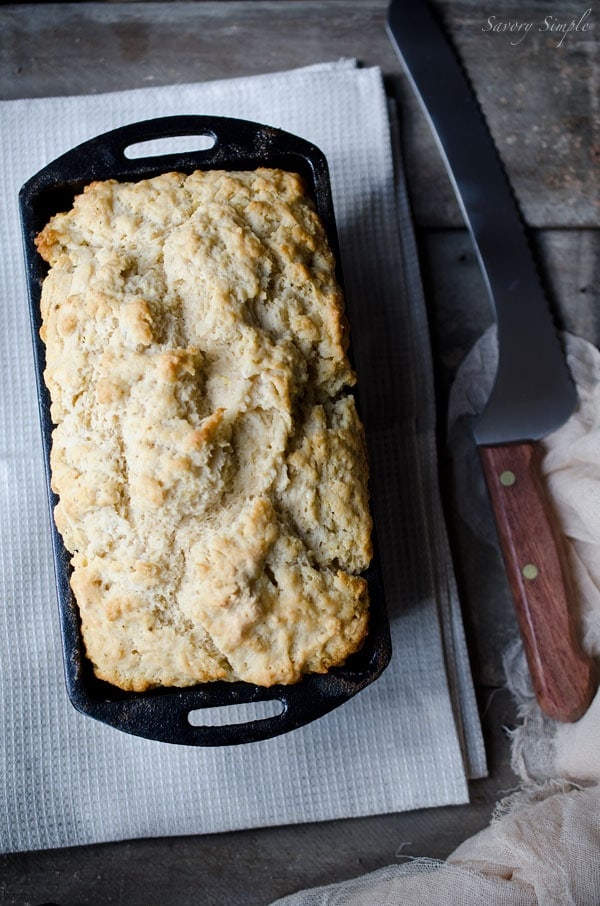 This summer ale beer bread has hints of lemon and pepper. No kneading required, ready in under an hour! Get this easy-to-follow recipe from SavorySimple.net