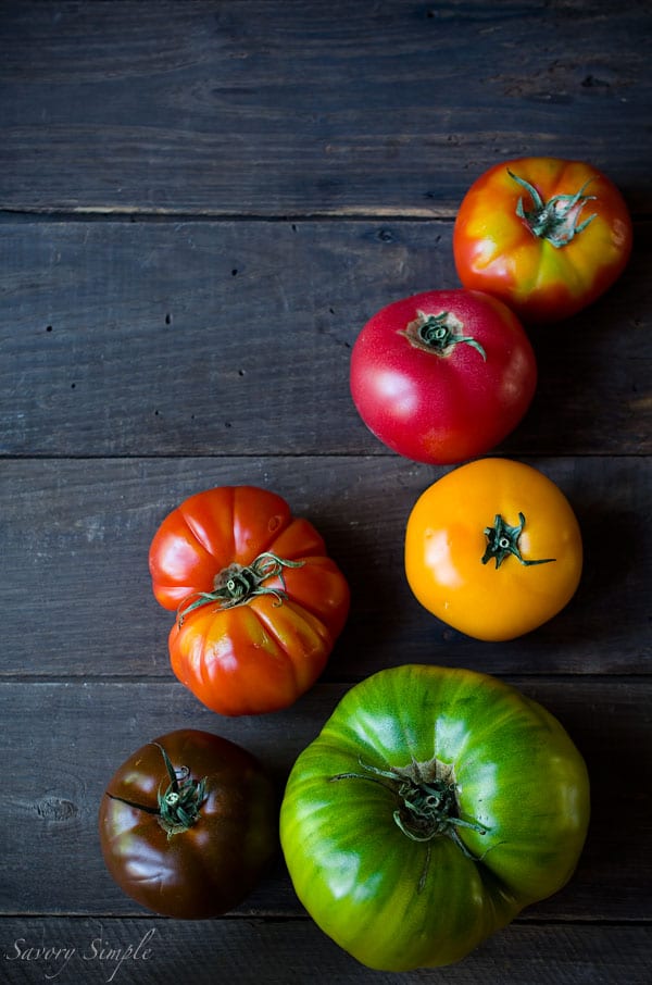 This Heirloom Panzanella Salad is a perfect way to enjoy summer's most beautiful tomato! Get the recipe from SavorySimple.net