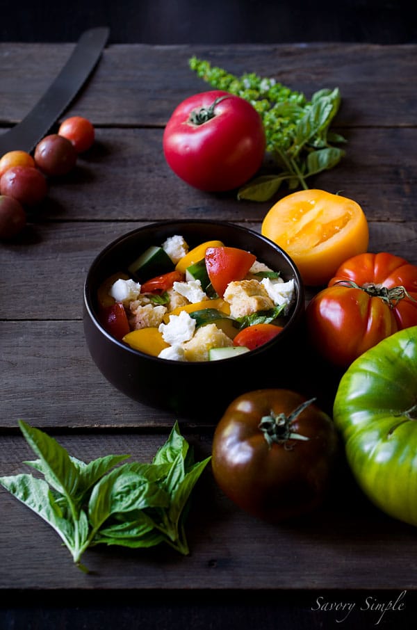 This Heirloom Panzanella Salad is a perfect way to enjoy summer's most beautiful tomato! Get the recipe from SavorySimple.net