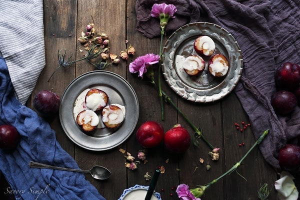 These roasted plums with creme fraiche are a simple, elegant dessert! Brown sugar adds just the right amount of sweetness. Get the recipe from SavorySimple.net.