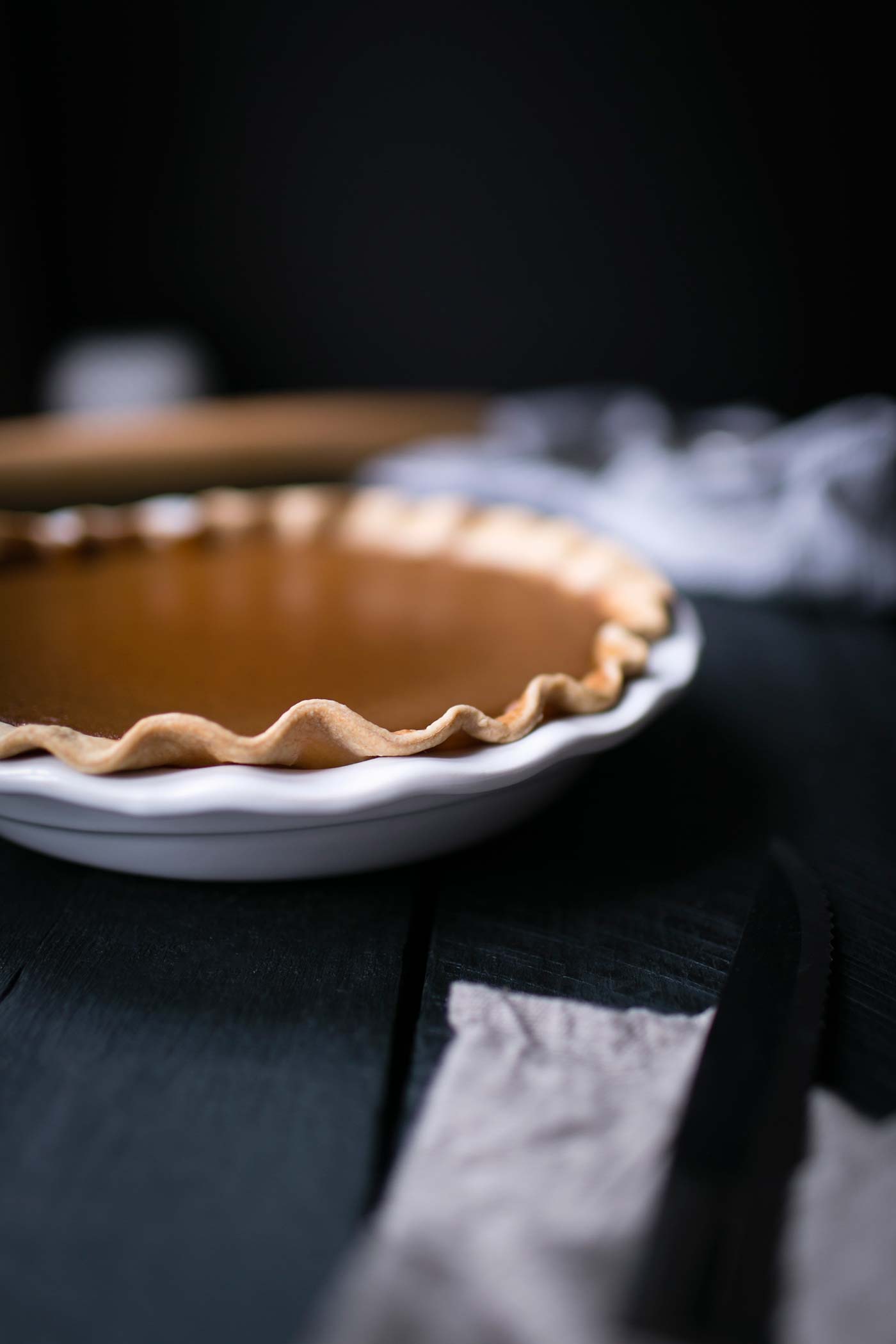 This Brandied Acorn Squash Pie is perfect for Thanksgiving! Acorn squash is naturally sweeter than pumpkin and works amazingly well in desserts. Get the recipe from SavorySimple.net.