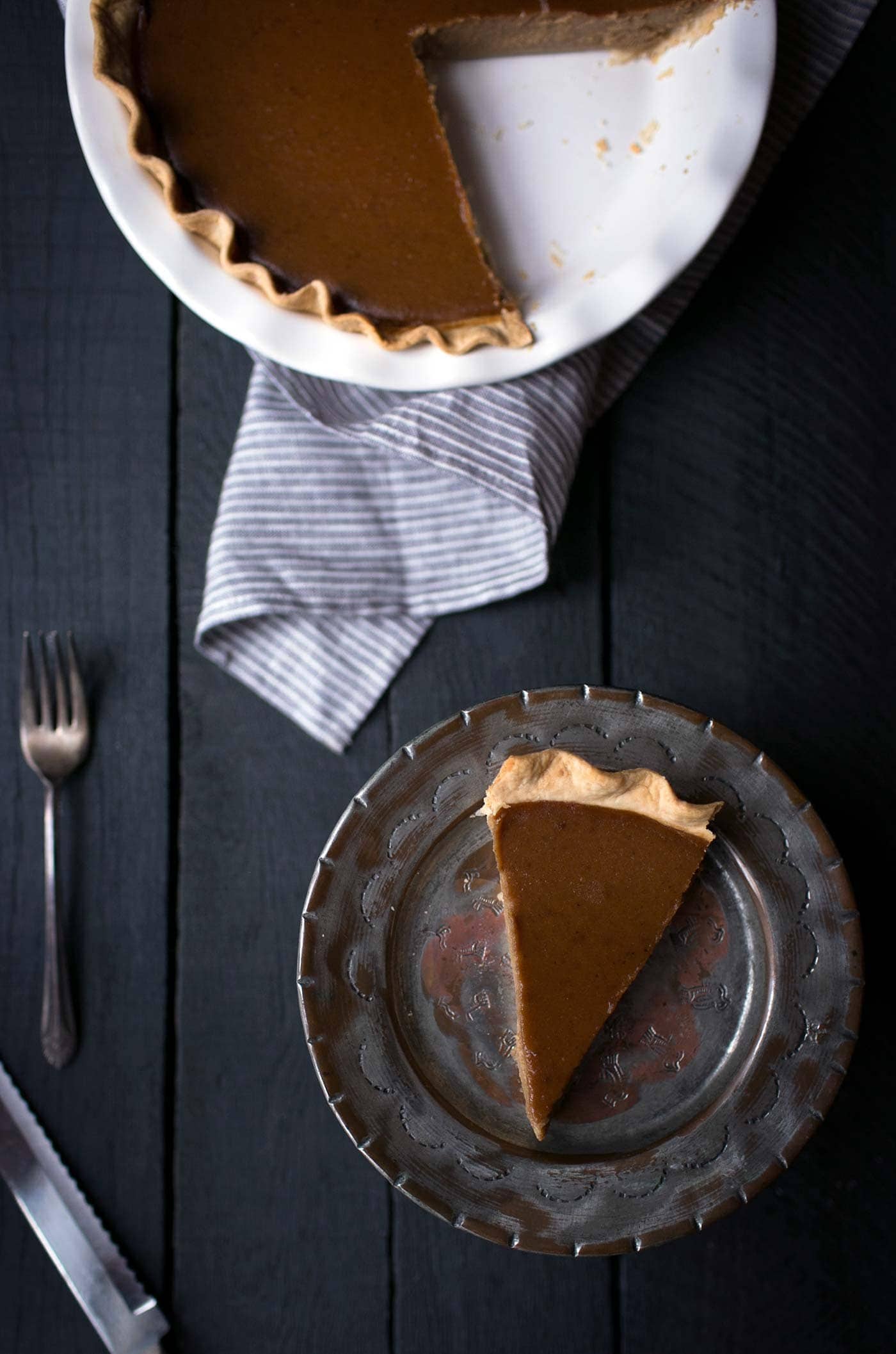 This Brandied Acorn Squash Pie is perfect for Thanksgiving! Acorn squash is naturally sweeter than pumpkin and works amazingly well in desserts. Get the recipe from SavorySimple.net.