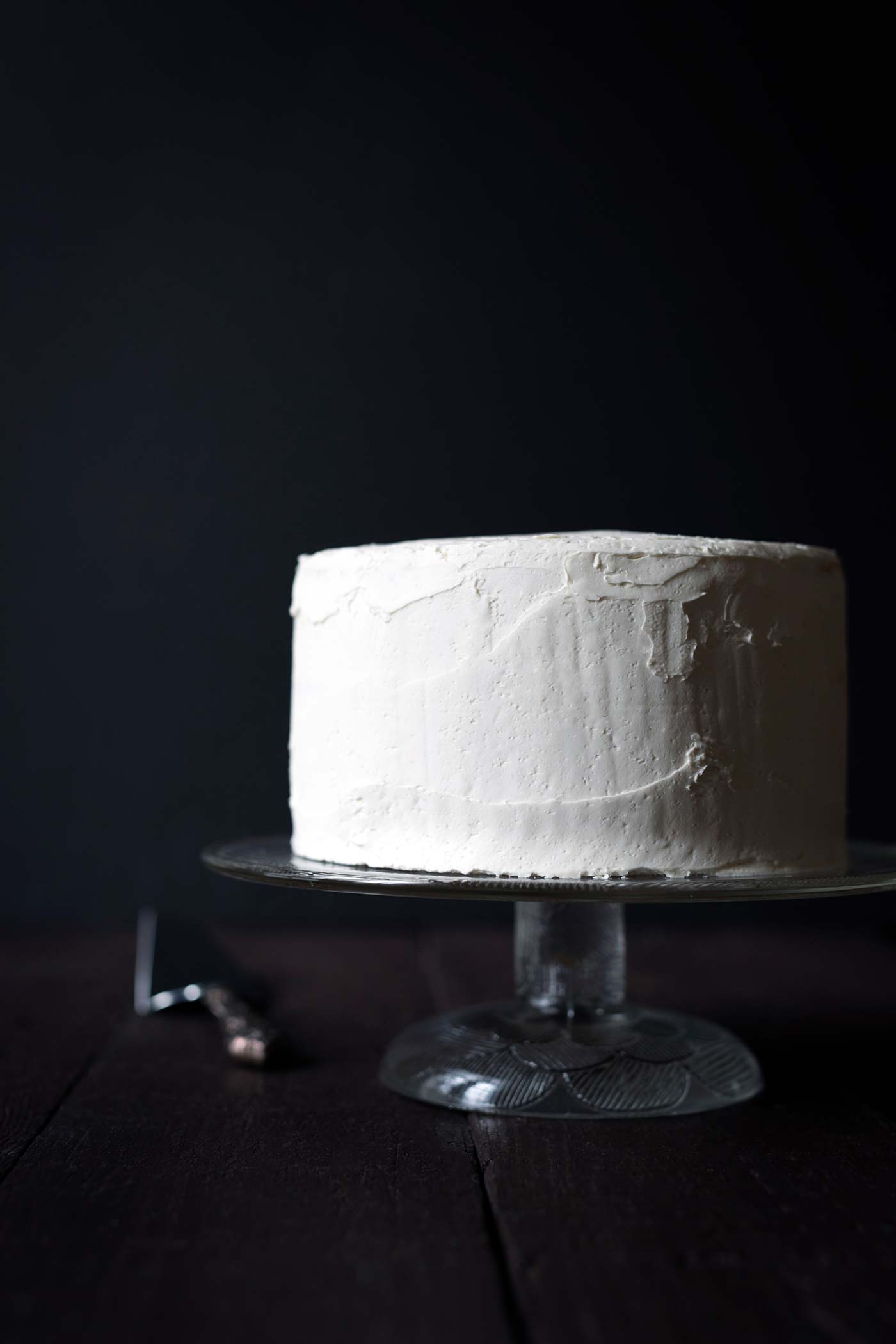 Impress your guests with this gorgeous and impressive Eggnog Rum Layer Cake! It's perfect for holiday parties. Get the recipe from SavorySimple.net