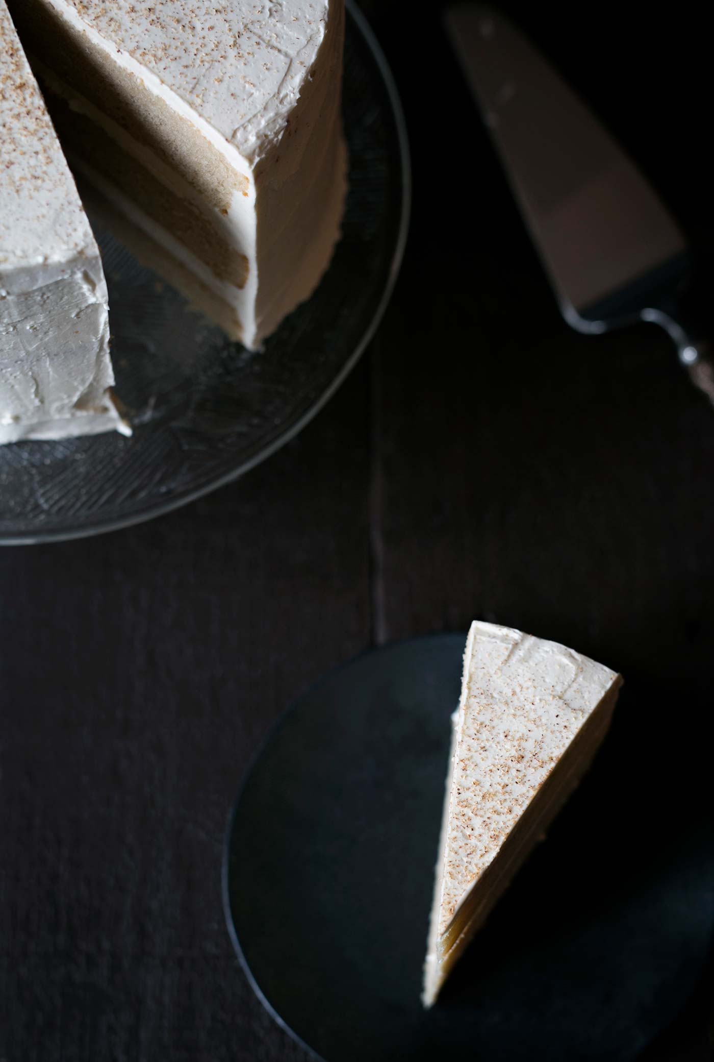 Impress your guests with this gorgeous and impressive Eggnog Rum Layer Cake! It's perfect for holiday parties. Get the recipe from SavorySimple.net