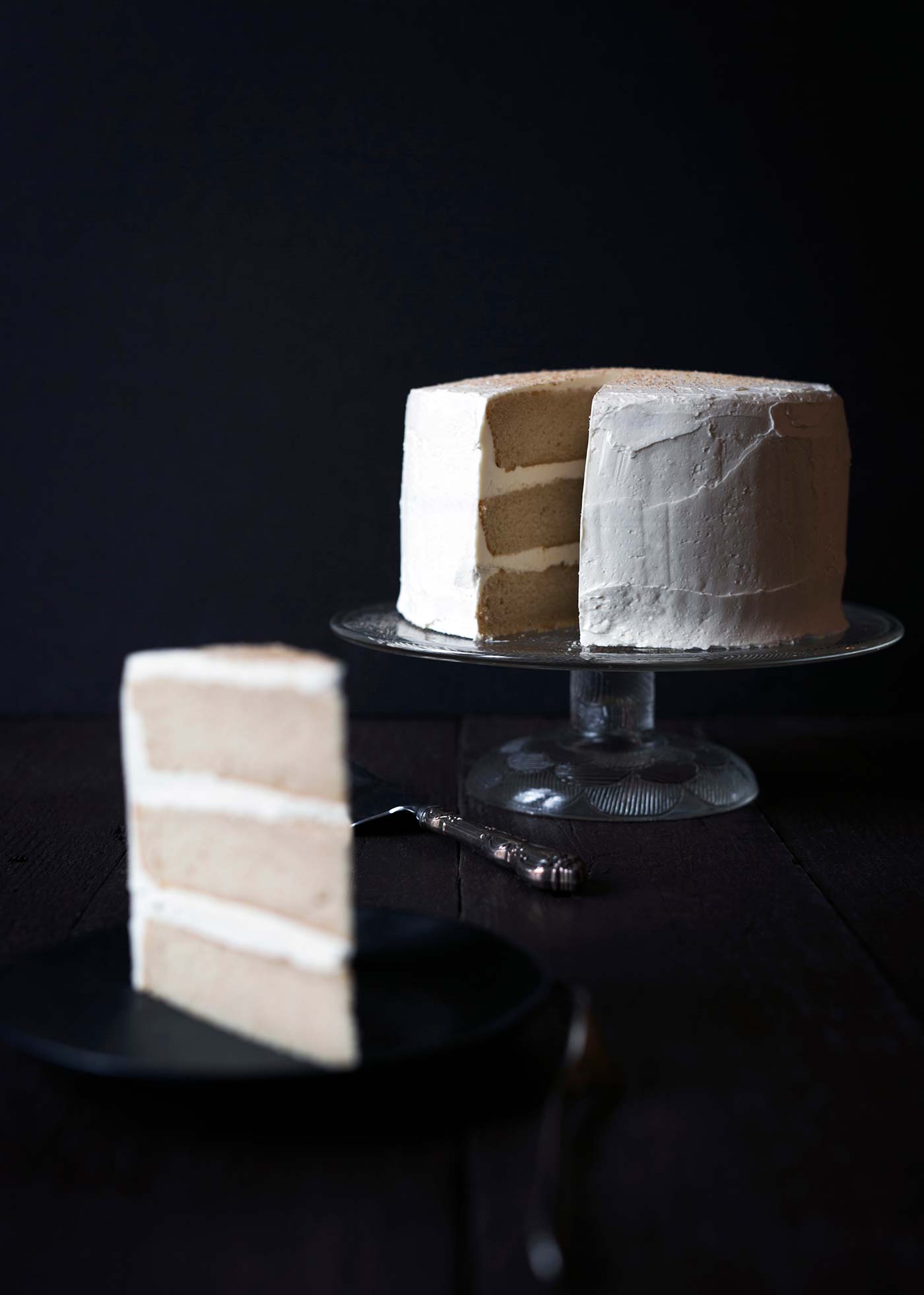 Impress your guests with this gorgeous and impressive Eggnog Rum Layer Cake! It's perfect for holiday parties. Get the recipe from SavorySimple.net