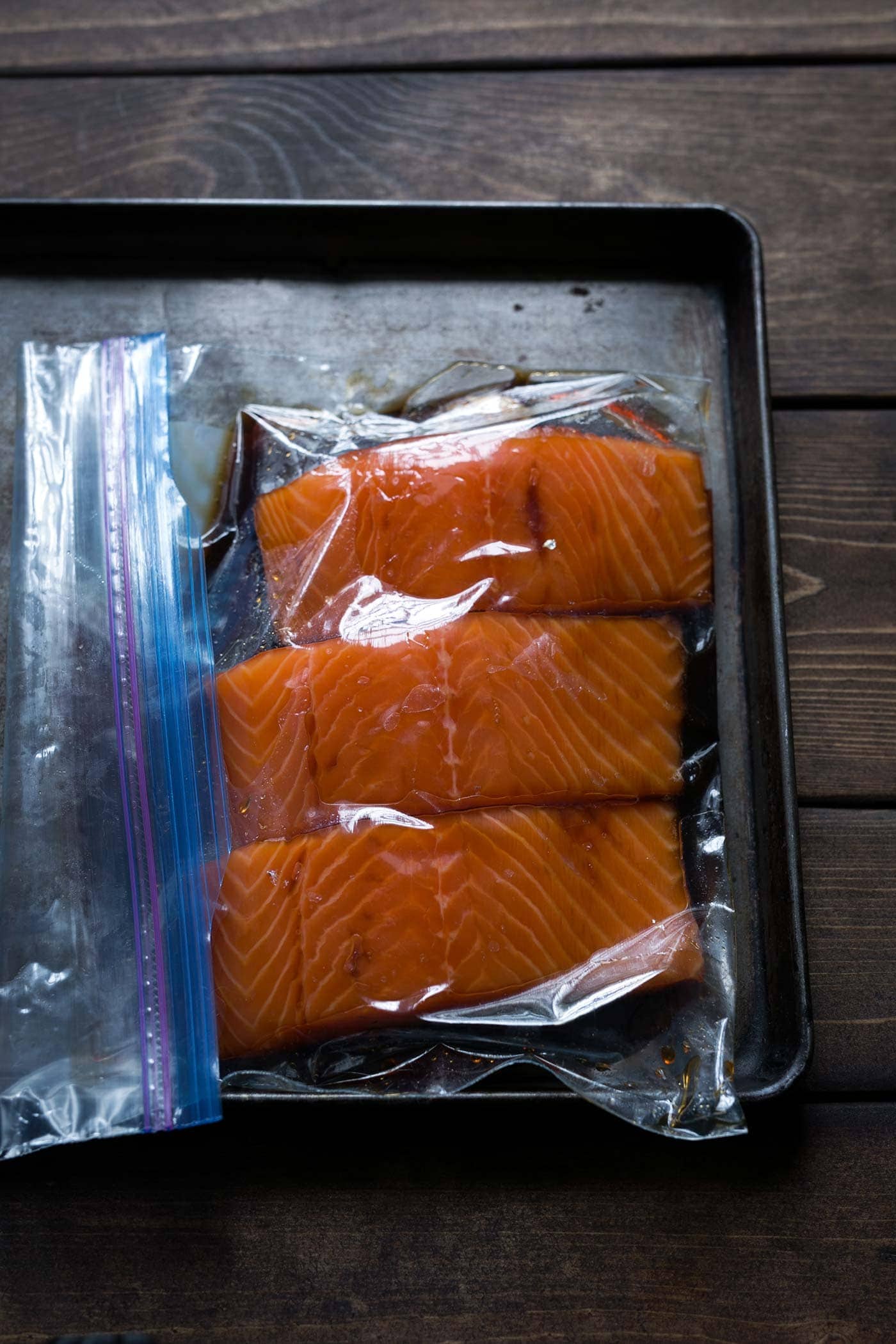 This baked Honey Soy Glazed Salmon with Caramelized Pineapples is a tasty, easy meal with only a few simple ingredients! Dinner is ready in under an hour (and that’s mostly inactive). SavorySimple.net