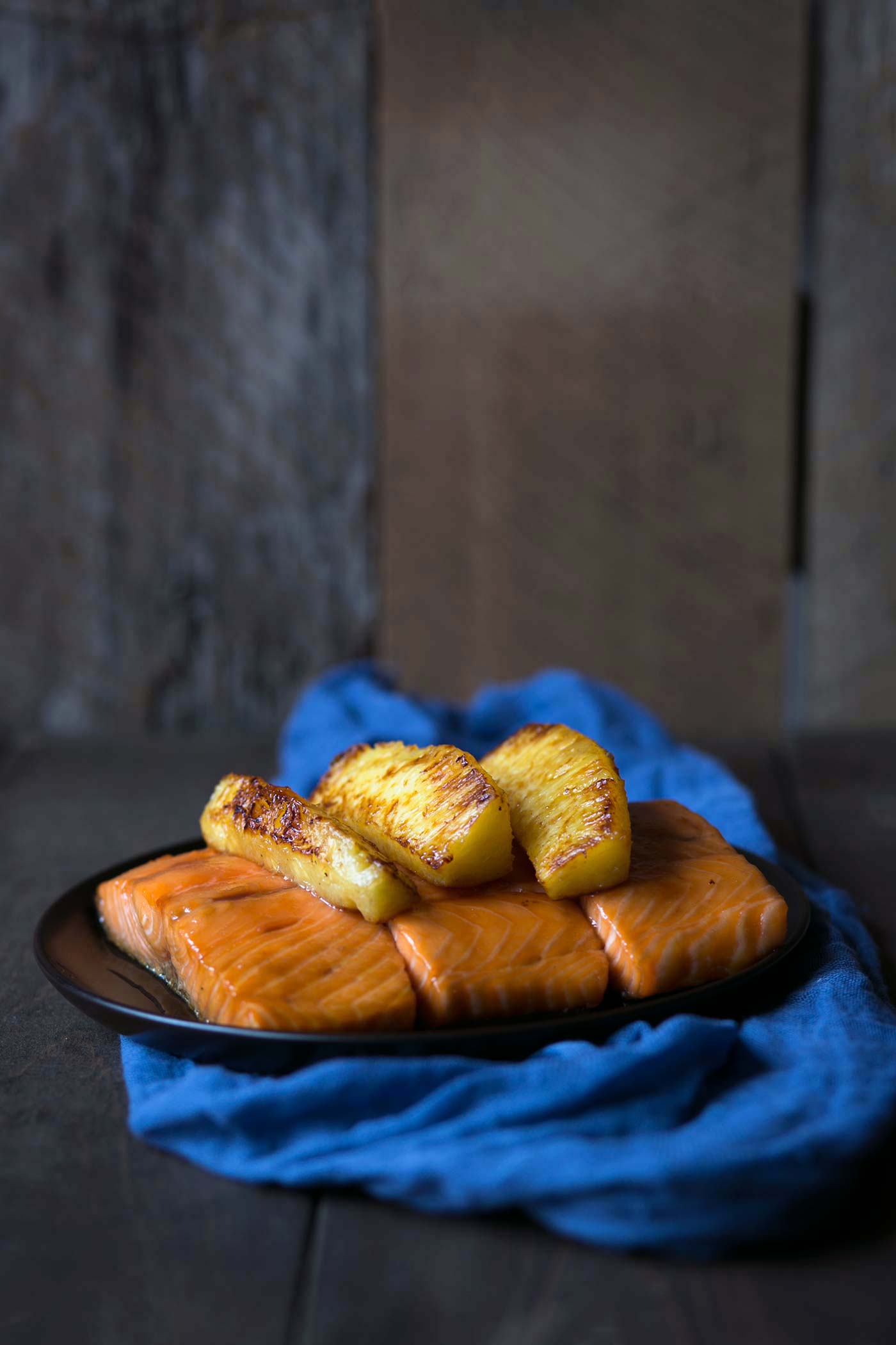 This baked Honey Soy Glazed Salmon with Caramelized Pineapples is a tasty, easy meal with only a few simple ingredients! Dinner is ready in under an hour (and that’s mostly inactive). SavorySimple.net