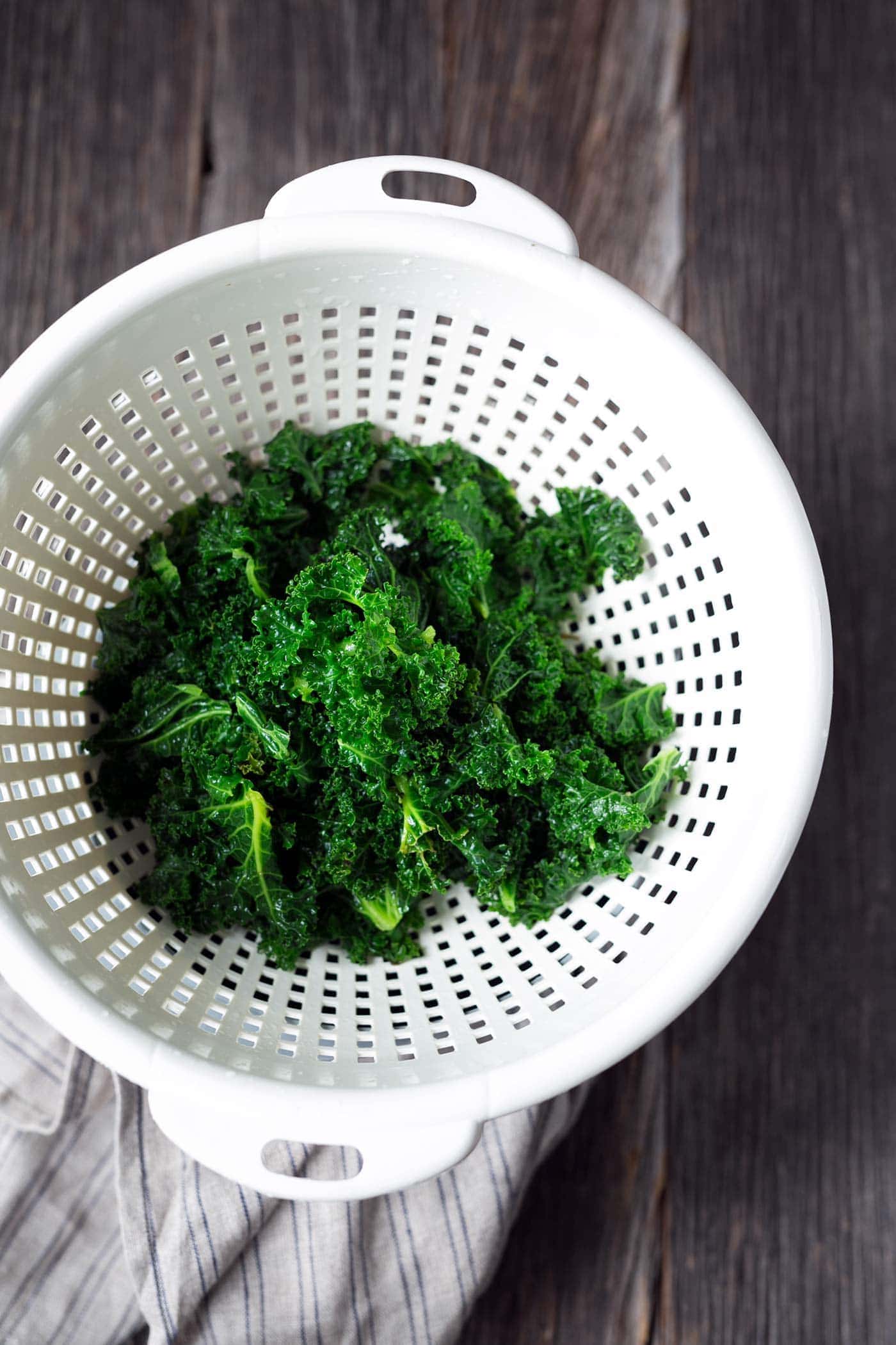 Kale in a colander.