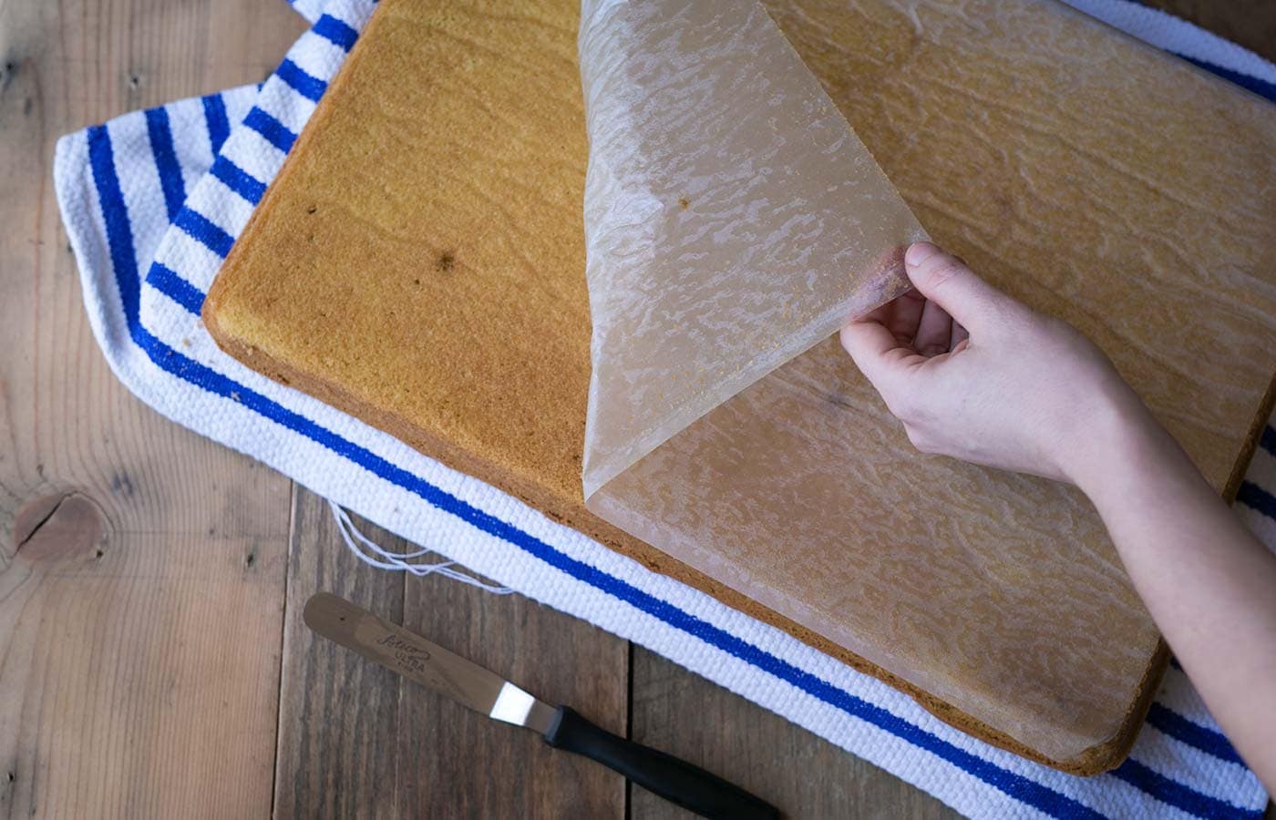Yellow Sheet Cake with Chocolate Sour Cream Frosting is a perfect cake to serve at parties! The cake is tender, the frosting is sweet and tangy, and the entire thing can be prepped in advance. SavorySimple.net