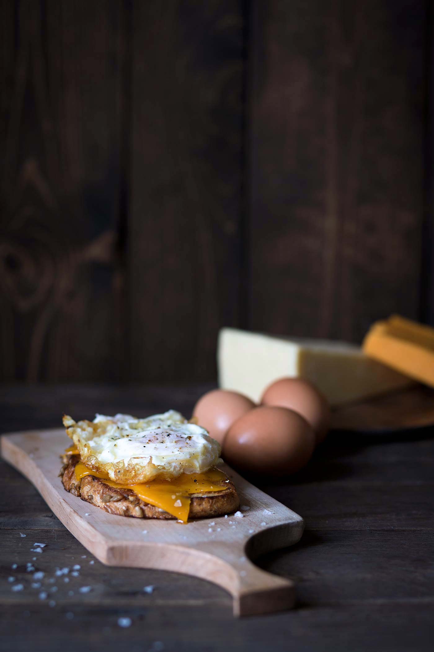 Want a treat yourself? This Open-Faced Grilled Cheese Sandwich is topped with mild cheddar cheese and a Spanish fried egg. It’s total decadence. SavorySimple.net.