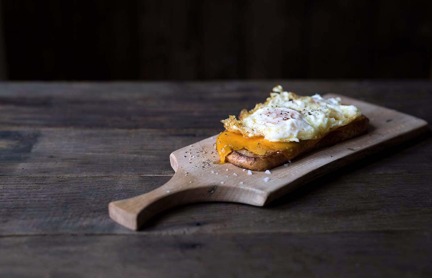 Want a treat yourself? This Open-Faced Grilled Cheese Sandwich is topped with mild cheddar cheese and a Spanish fried egg. It’s total decadence. SavorySimple.net.