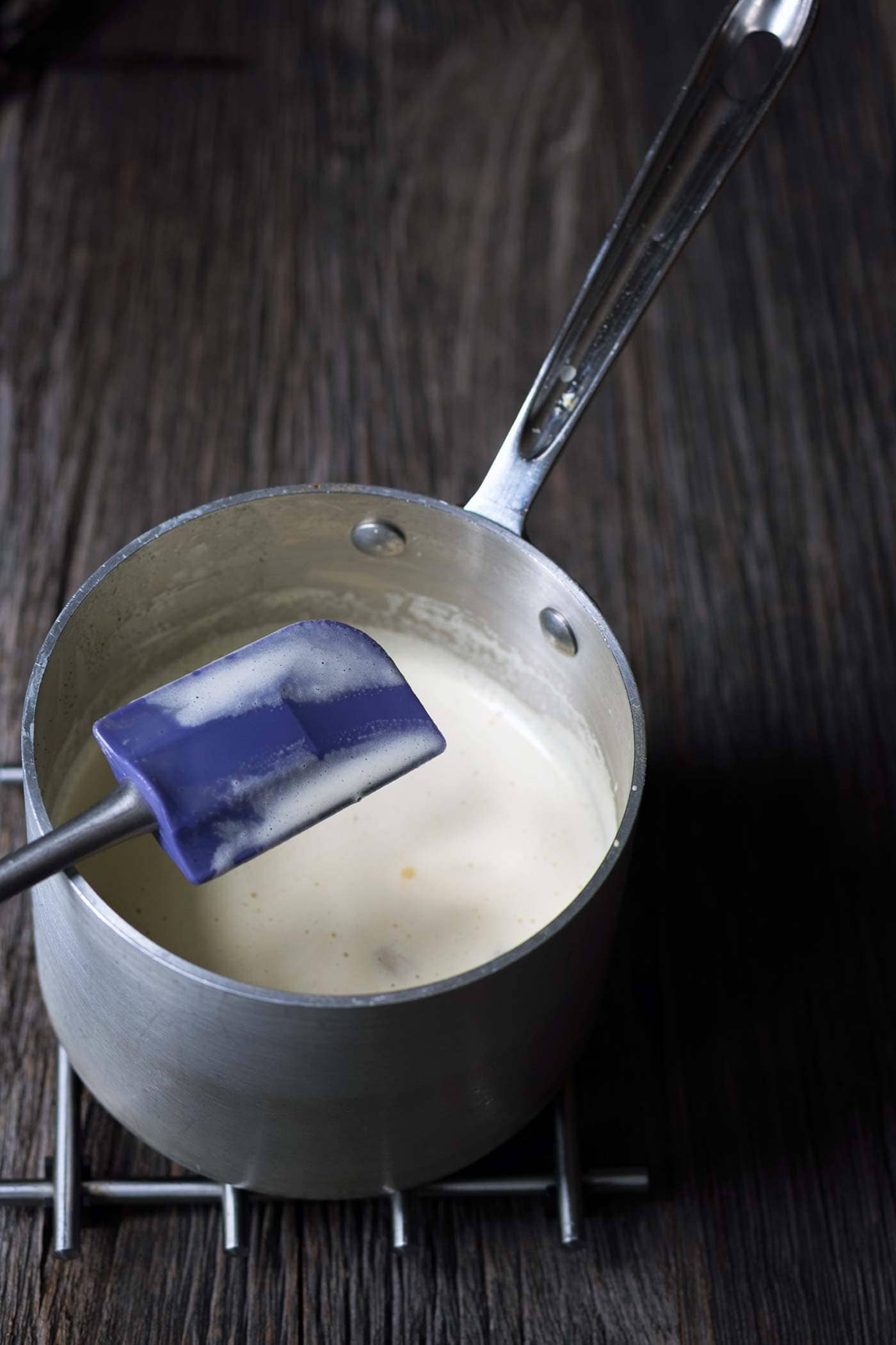 This Vanilla Bean Cardamom Strawberry Ice Cream is an incredible combination of flavors. If you love homemade ice cream, you simply must try this recipe! SavorySimple.net