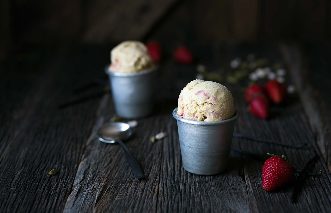 This Vanilla Bean Cardamom Strawberry Ice Cream is an incredible combination of flavors. If you love homemade ice cream, you simply must try this recipe! SavorySimple.net
