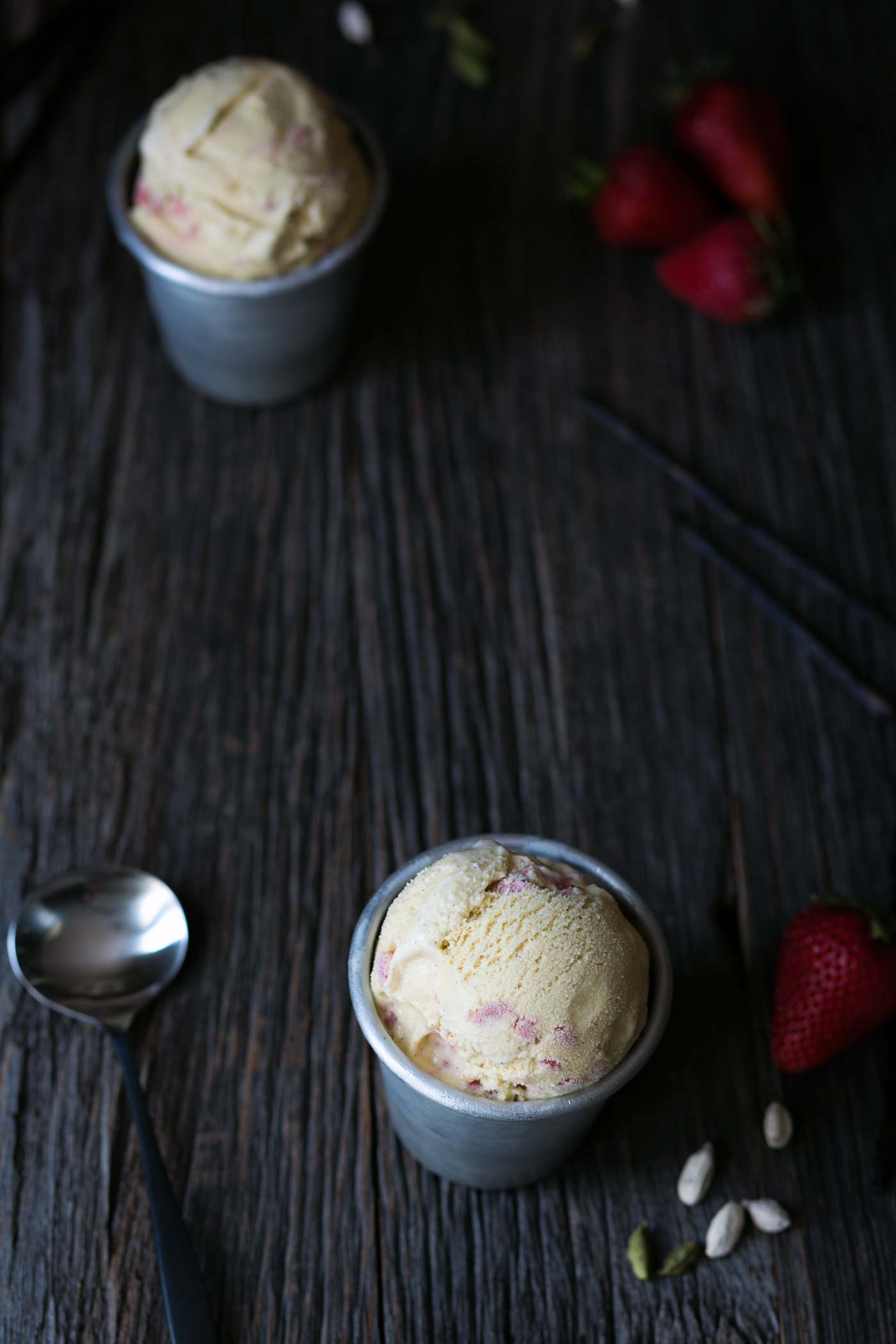 This Vanilla Bean Cardamom Strawberry Ice Cream is an incredible combination of flavors. If you love homemade ice cream, you simply must try this recipe! SavorySimple.net