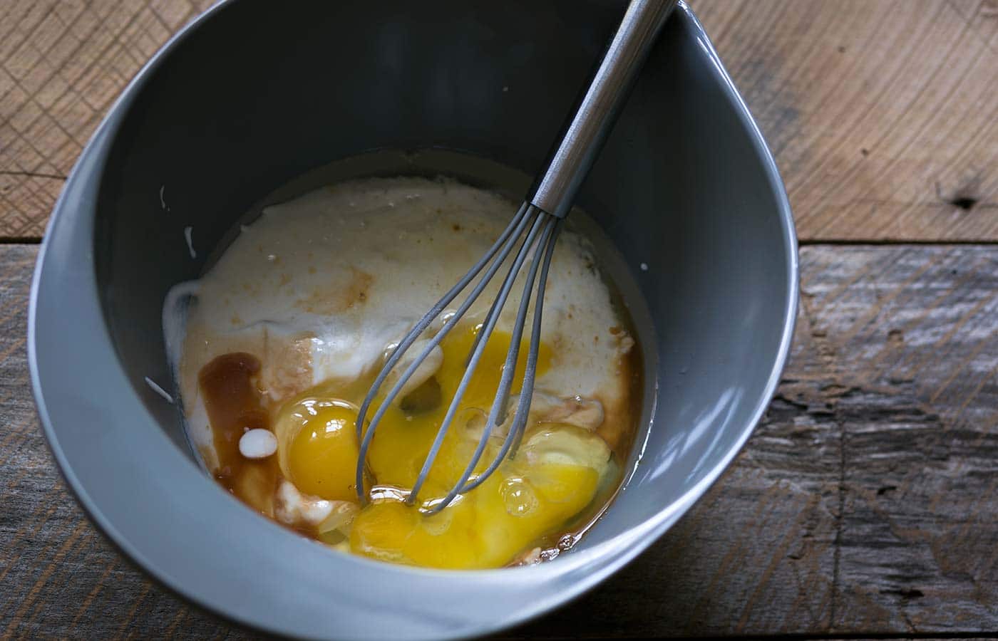 Stone Fruit Yogurt Muffins are incredibly soft, moist, and easy to prepare. Bursting with summer flavor, these delicate treats are a perfect addition to the breakfast table. SavorySimple.net