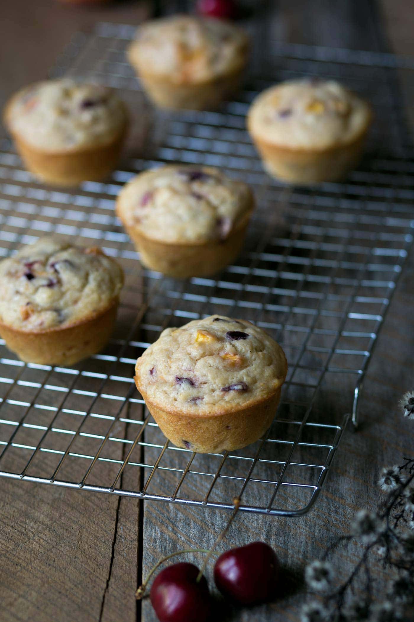 Stone Fruit Yogurt Muffins are incredibly soft, moist, and easy to prepare. Bursting with summer flavor, these delicate treats are a perfect addition to the breakfast table. SavorySimple.net