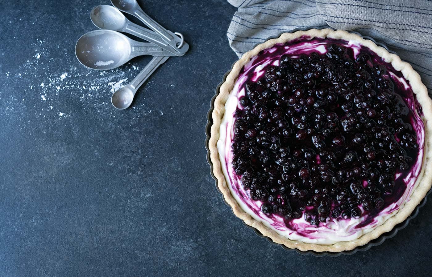 This Wild Blueberry Lemon Cream Tart is surprisingly light and delicate. Served chilled or at room temperature, it’s a perfect summer dessert. SavorySimple.net